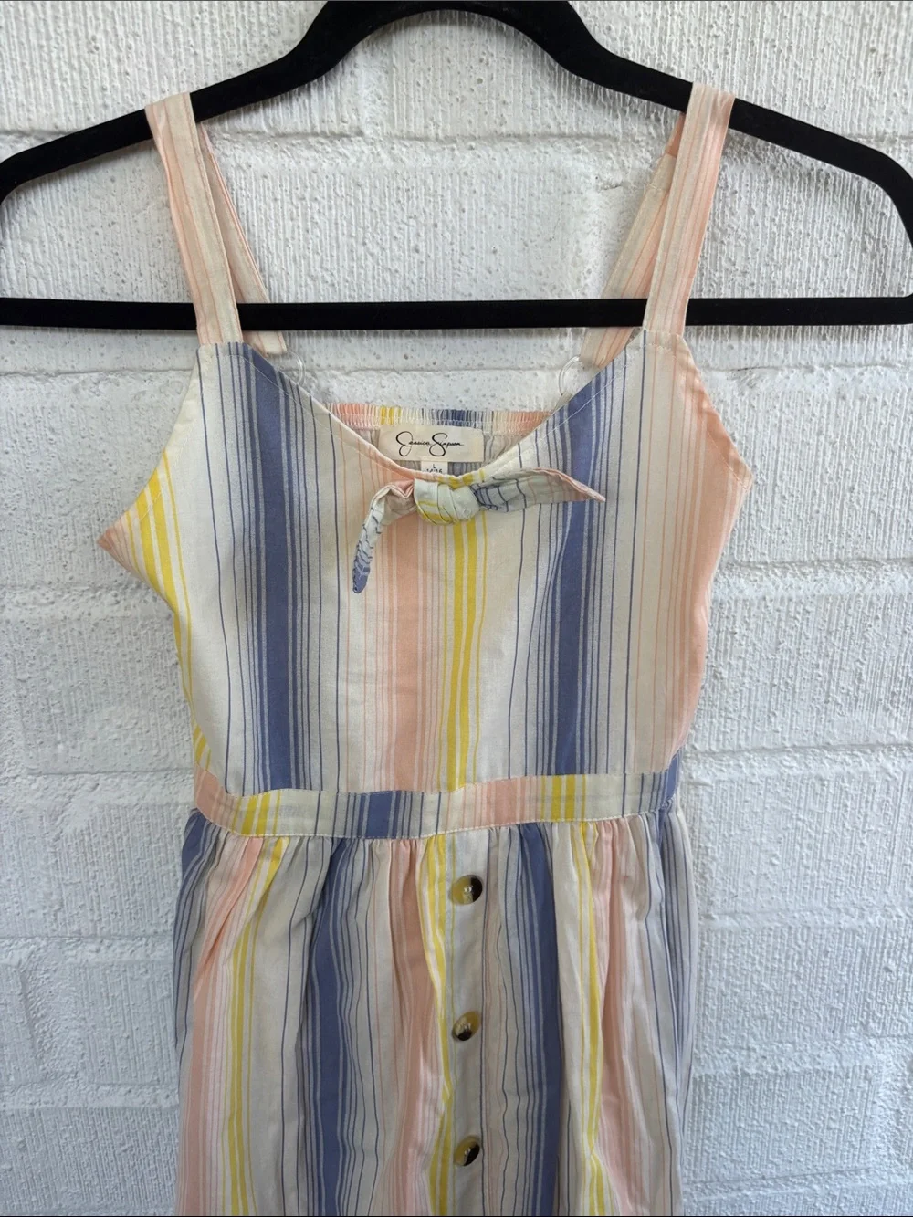 Jessica Simpson sleeveless button